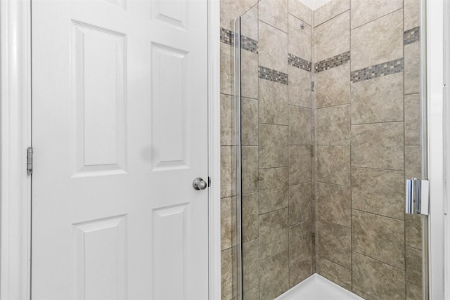 bathroom with a stall shower