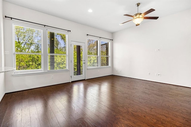 unfurnished room featuring baseboards, a ceiling fan, wood finished floors, and recessed lighting