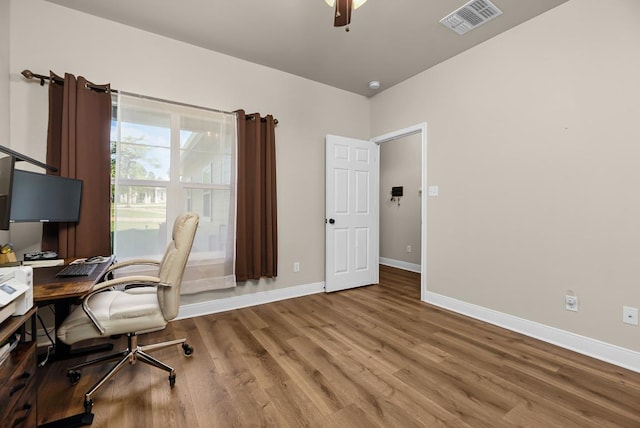 125 Brahman Ct, Bastrop, TX 78602 - office space featuring wood finished floors, baseboards, and ceiling fan