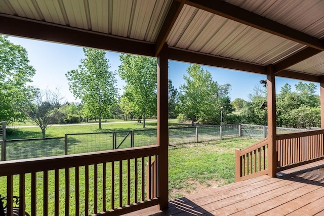 125 Brahman Ct, Bastrop, TX 78602 - wooden terrace featuring view of scattered trees