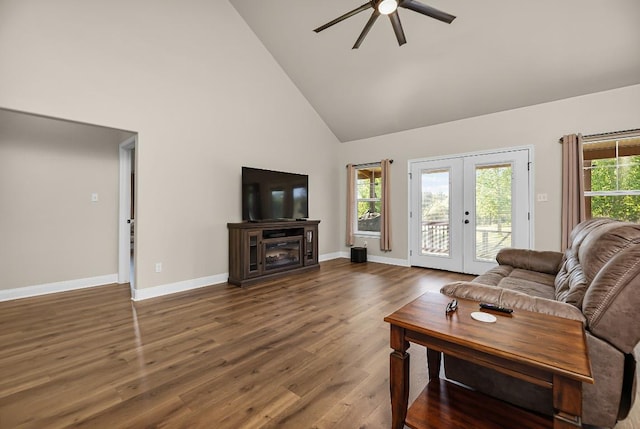 125 Brahman Ct, Bastrop, TX 78602 - living area with high vaulted ceiling, french doors, a ceiling fan, baseboards, and dark wood-style floors