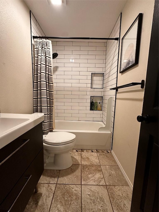 16903 Isle Of Man Rd, Pflugerville, TX 78660 - full bathroom featuring vanity, shower / tub combo, toilet, and baseboards