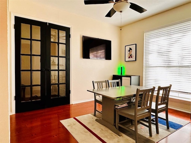 16903 Isle Of Man Rd, Pflugerville, TX 78660 - dining area featuring french doors, a ceiling fan, wood finished floors, and baseboards