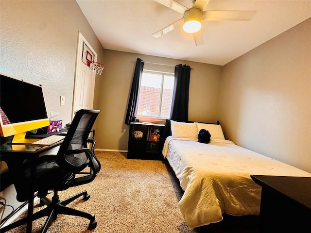 16903 Isle Of Man Rd, Pflugerville, TX 78660 - bedroom with carpet, an office area, baseboards, and ceiling fan