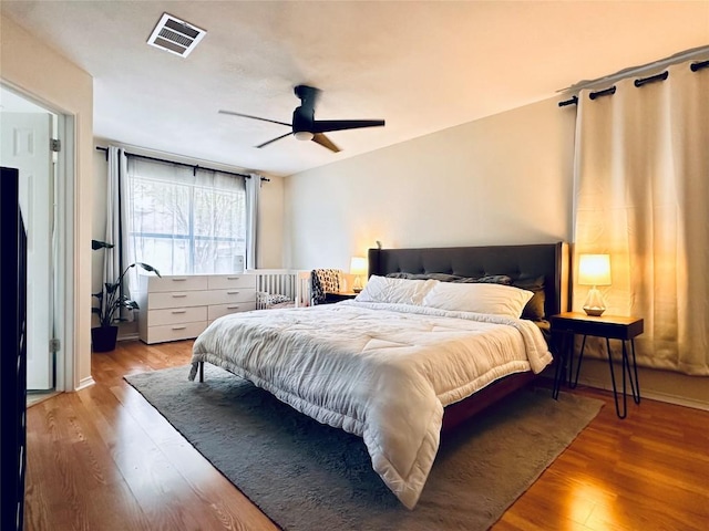 16903 Isle Of Man Rd, Pflugerville, TX 78660 - bedroom with wood finished floors and a ceiling fan