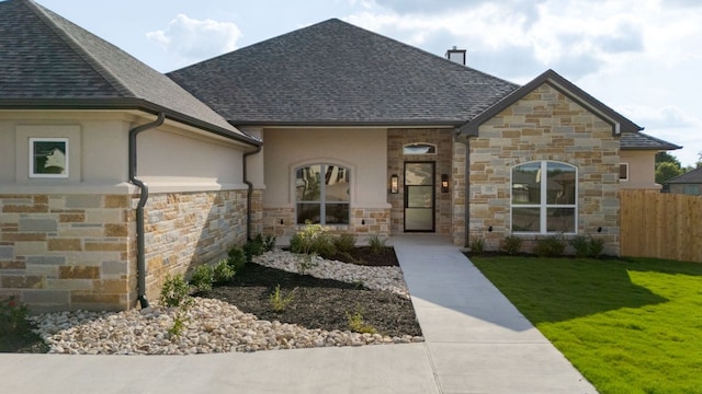112 Vista De Luna Ln, Belton, TX 76513 - view of front of property featuring stone siding, a shingled roof, and stucco siding