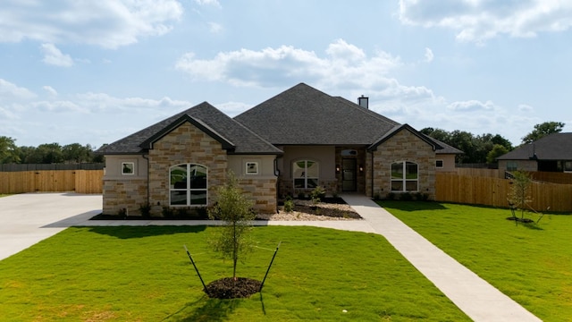112 Vista De Luna Ln, Belton, TX 76513 - french country inspired facade featuring stone siding, a chimney, and a shingled roof
