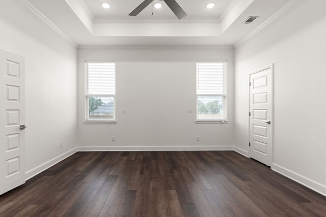 112 Vista De Luna Ln, Belton, TX 76513 - spare room with a tray ceiling, plenty of natural light, dark wood-type flooring, and crown molding