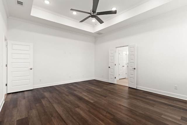 112 Vista De Luna Ln, Belton, TX 76513 - empty room with a tray ceiling, crown molding, ceiling fan, dark wood-type flooring, and recessed lighting