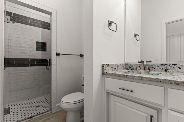 112 Vista De Luna Ln, Belton, TX 76513 - bathroom featuring a shower stall, vanity, and wood finished floors