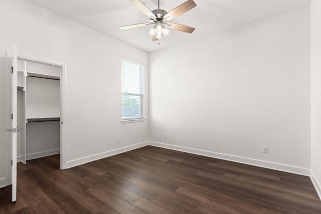112 Vista De Luna Ln, Belton, TX 76513 - unfurnished bedroom with dark wood-style flooring, a walk in closet, and ceiling fan