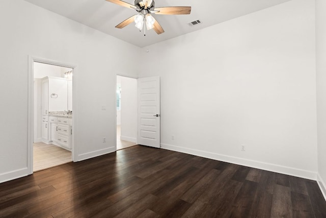 112 Vista De Luna Ln, Belton, TX 76513 - unfurnished bedroom featuring dark wood-type flooring and ensuite bath