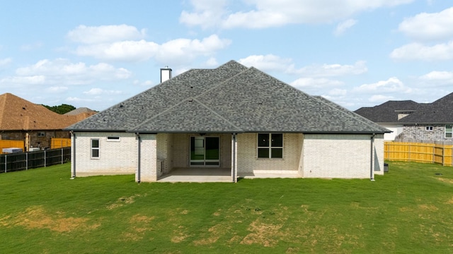 112 Vista De Luna Ln, Belton, TX 76513 - back of property with a fenced backyard, a patio area, a chimney, and brick siding