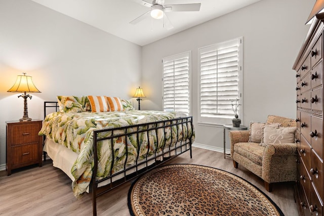 1013 Highknoll Ln, Georgetown, TX 78628 - bedroom with wood finished floors and a ceiling fan