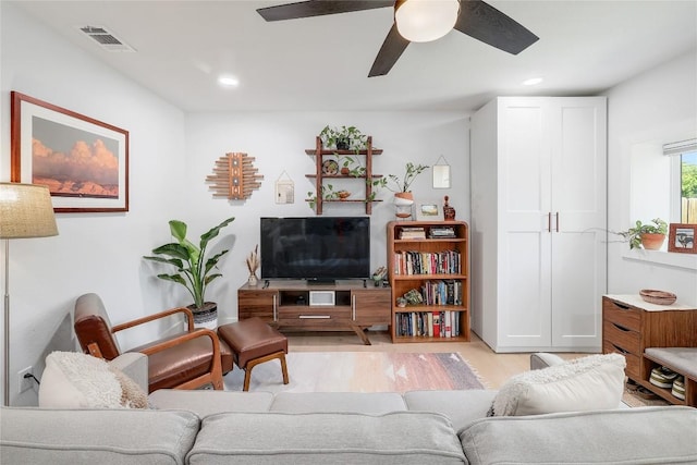 1616 Webberville Rd Unit A, Austin, TX 78721 - living area with ceiling fan, recessed lighting, and light wood-type flooring