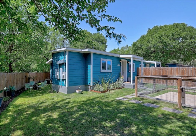 1616 Webberville Rd Unit A, Austin, TX 78721 - back of house featuring a fenced backyard