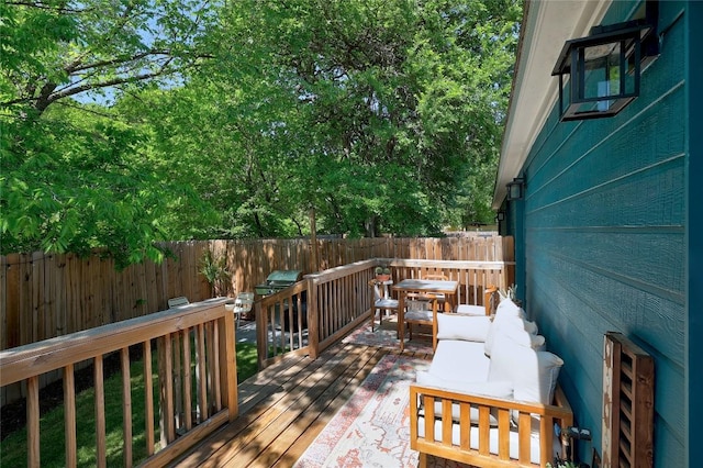 1616 Webberville Rd Unit A, Austin, TX 78721 - wooden terrace featuring a fenced backyard and an outdoor living space