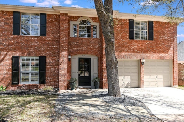 8007 Davis Mountain Cv, Austin, TX 78726 - view of front of property with concrete driveway, brick siding, and a garage