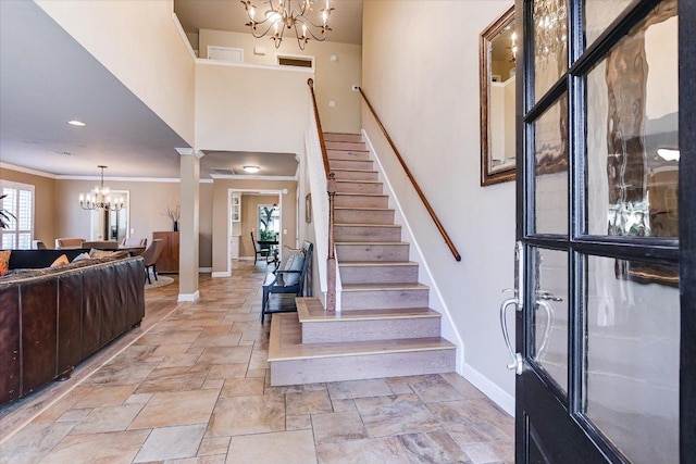 8007 Davis Mountain Cv, Austin, TX 78726 - stairs featuring a chandelier, baseboards, stone tile floors, ornamental molding, and a towering ceiling