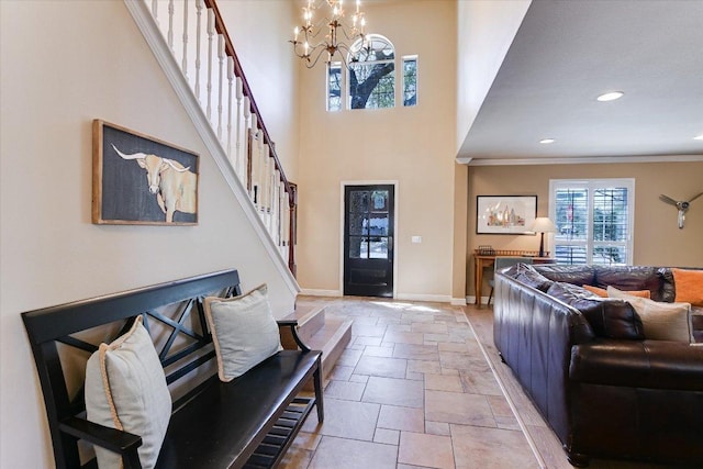 8007 Davis Mountain Cv, Austin, TX 78726 - entrance foyer featuring stone tile flooring, stairs, a chandelier, recessed lighting, and crown molding