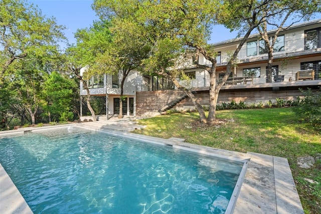 7 Rocky River Cv, West Lake Hills, TX 78746 - outdoor pool with a lawn