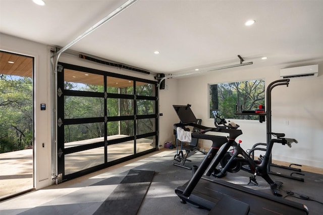 7 Rocky River Cv, West Lake Hills, TX 78746 - exercise room featuring a wealth of natural light, recessed lighting, and a wall mounted AC