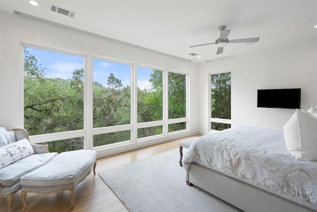 7 Rocky River Cv, West Lake Hills, TX 78746 - bedroom featuring visible vents, recessed lighting, wood finished floors, and a ceiling fan