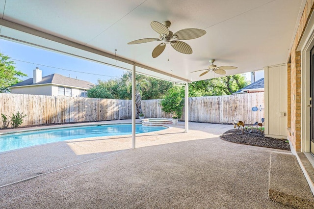 8404 Cahill Dr, Austin, TX 78729 - view of swimming pool with a ceiling fan, a fenced backyard, a patio, and a pool with connected hot tub