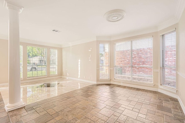 8404 Cahill Dr, Austin, TX 78729 - unfurnished room with ornamental molding, ornate columns, baseboards, and stone tile floors
