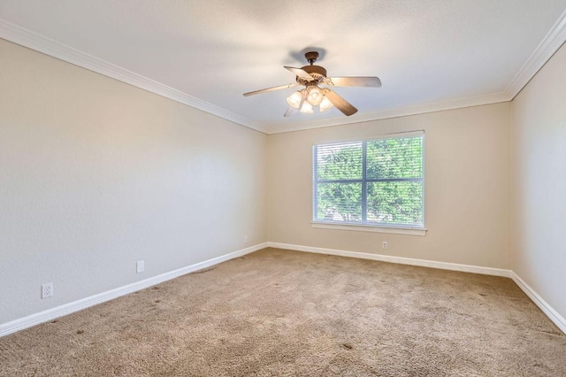 8404 Cahill Dr, Austin, TX 78729 - empty room featuring carpet floors, baseboards, a ceiling fan, and crown molding