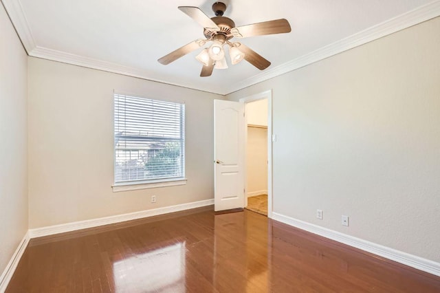 8404 Cahill Dr, Austin, TX 78729 - spare room featuring wood finished floors, baseboards, ornamental molding, and ceiling fan