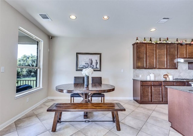 4829 Pyrenees Pass, Austin, TX 78738 - dining room with recessed lighting and light tile patterned floors