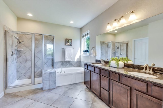 4829 Pyrenees Pass, Austin, TX 78738 - bathroom with a shower stall, a garden tub, double vanity, tile patterned flooring, and recessed lighting