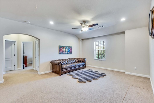 4829 Pyrenees Pass, Austin, TX 78738 - living area featuring light colored carpet, arched walkways, a ceiling fan, recessed lighting, and vaulted ceiling