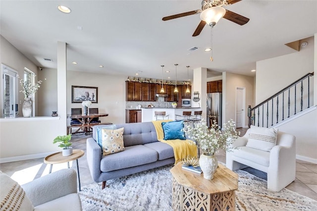 4829 Pyrenees Pass, Austin, TX 78738 - living room featuring light tile patterned floors, a ceiling fan, stairway, and recessed lighting