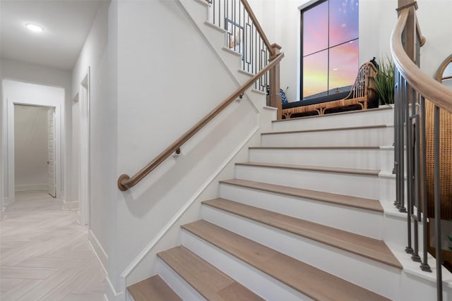 505 Woodside Ter, Austin, TX 78738 - stairs with baseboards and recessed lighting
