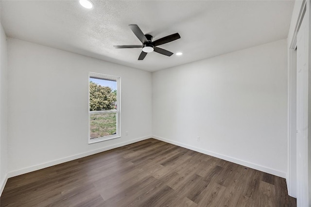 12305 Rustic Manor Ct, Austin, TX 78750 - empty room featuring dark wood-style floors, ceiling fan, and recessed lighting