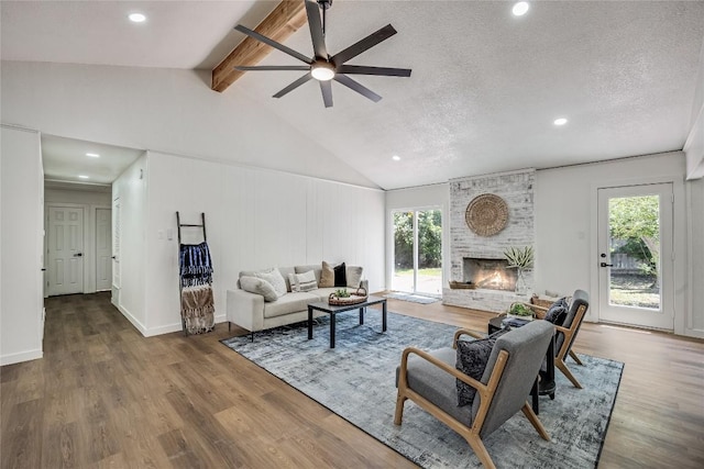 12305 Rustic Manor Ct, Austin, TX 78750 - living room with ceiling fan, plenty of natural light, wood finished floors, and recessed lighting