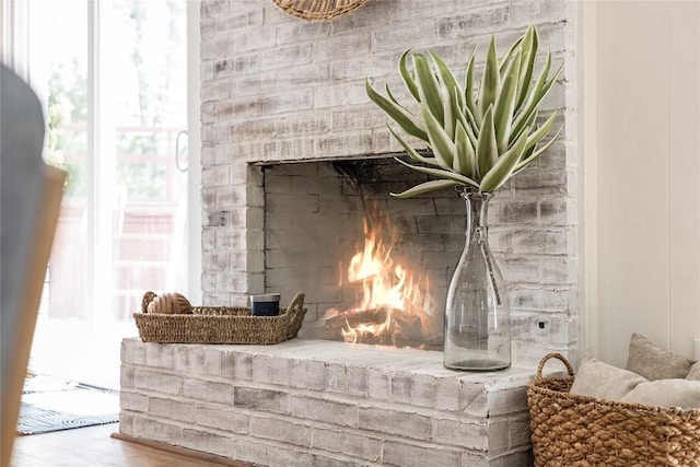 12305 Rustic Manor Ct, Austin, TX 78750 - detailed view of a fireplace and wood finished floors