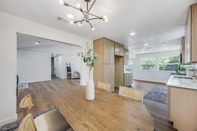 12305 Rustic Manor Ct, Austin, TX 78750 - dining room featuring dark wood-style flooring, a chandelier, and recessed lighting