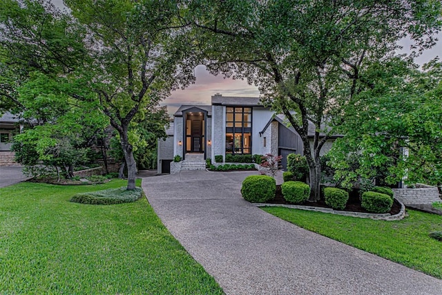 3502 Native Dancer Cv, Austin, TX 78746 - view of front of property featuring a lawn and driveway
