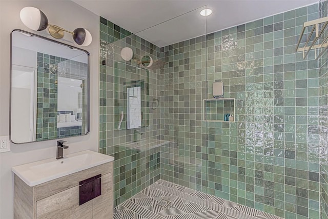 3502 Native Dancer Cv, Austin, TX 78746 - bathroom with tiled shower, vanity, and recessed lighting