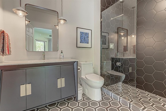 3502 Native Dancer Cv, Austin, TX 78746 - bathroom with toilet, vanity, and a tile shower