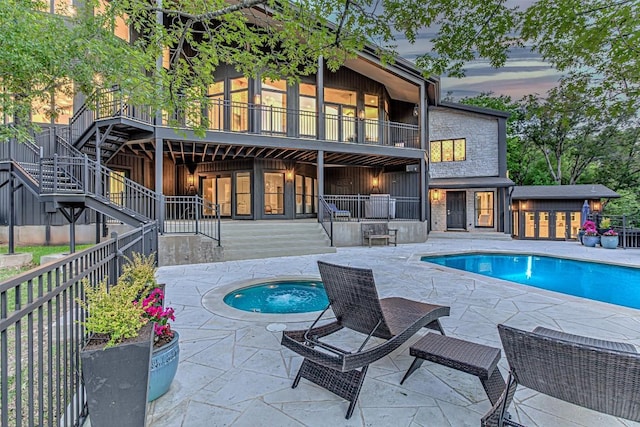3502 Native Dancer Cv, Austin, TX 78746 - view of swimming pool featuring stairs, an in-ground hot tub, and a patio