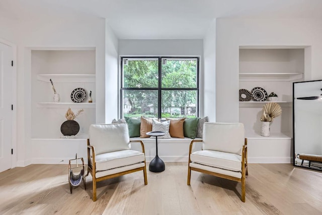 living area with wood finished floors