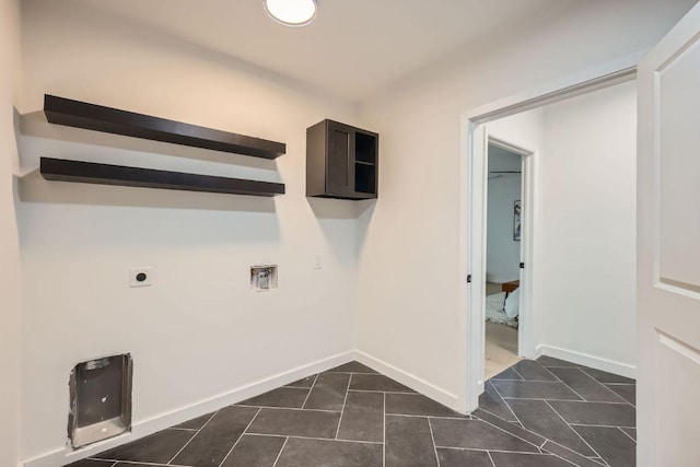 laundry room featuring baseboards, hookup for an electric dryer, laundry area, and washer hookup