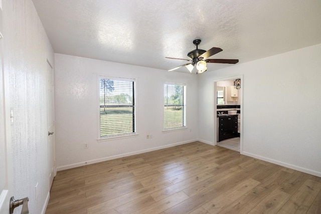 1229 State Highway 304, Gonzales, TX 78629 - spare room with ceiling fan and light wood-type flooring