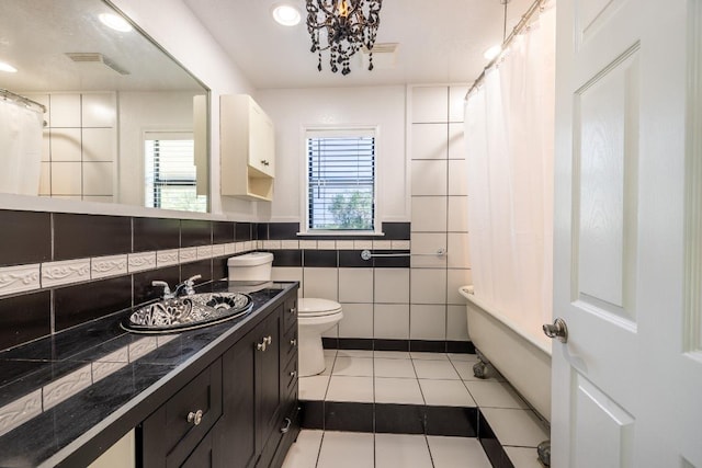 1229 State Highway 304, Gonzales, TX 78629 - full bathroom with vanity, tile patterned floors, tile walls, shower / bathtub combination with curtain, and recessed lighting