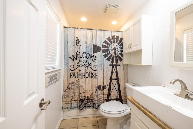1229 State Highway 304, Gonzales, TX 78629 - bathroom with vanity, tile patterned floors, healthy amount of natural light, and recessed lighting