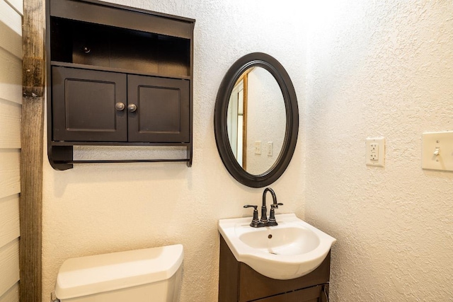 1229 State Highway 304, Gonzales, TX 78629 - half bathroom featuring vanity and toilet